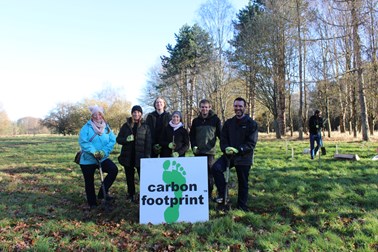 Picture of people from Farnborough airport and carbon footprint ltd in Southwood after planting 1,000 trees.