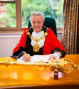 Mayor of Rushmoor Councillor Peter Cullum at his desk