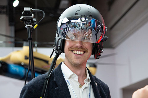 Man wearing futuristic military helmet