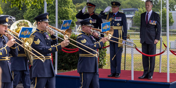 Military band passing VIPs