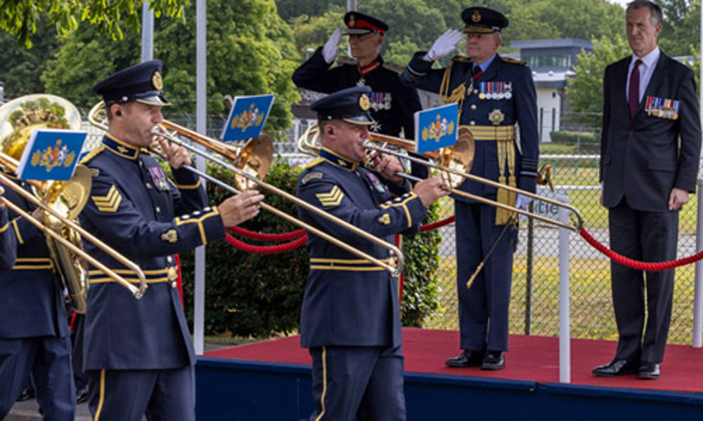 Military band passing VIPs