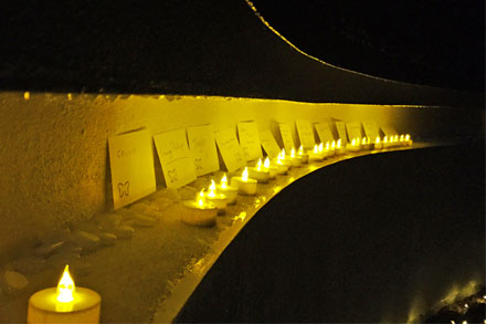 Wall with candles and cards