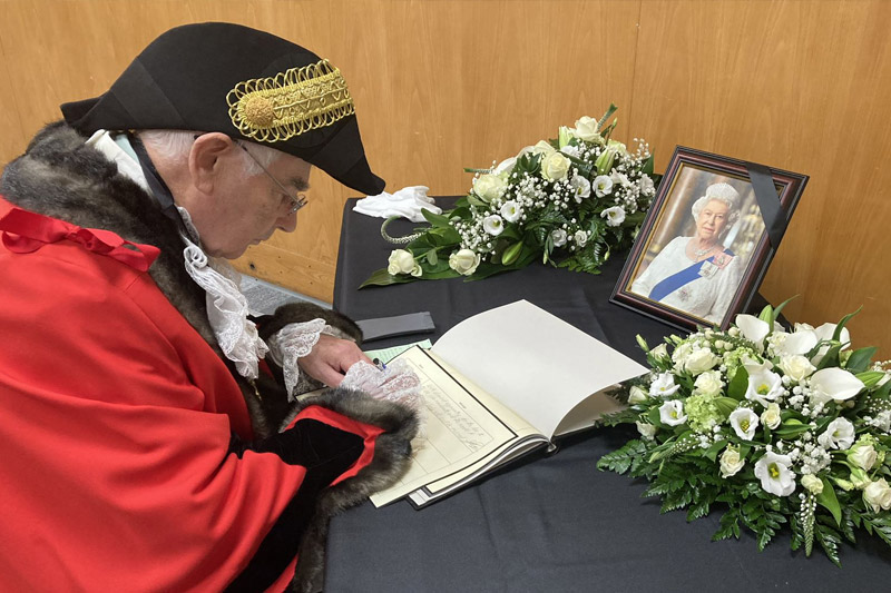 Mayor Signing The Book Of Condolence In Farnborough