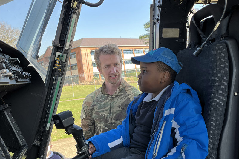 Child In Helicopter With Pilot