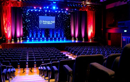 Photo showing the inside seating and stage at the Princes Hall Theatre