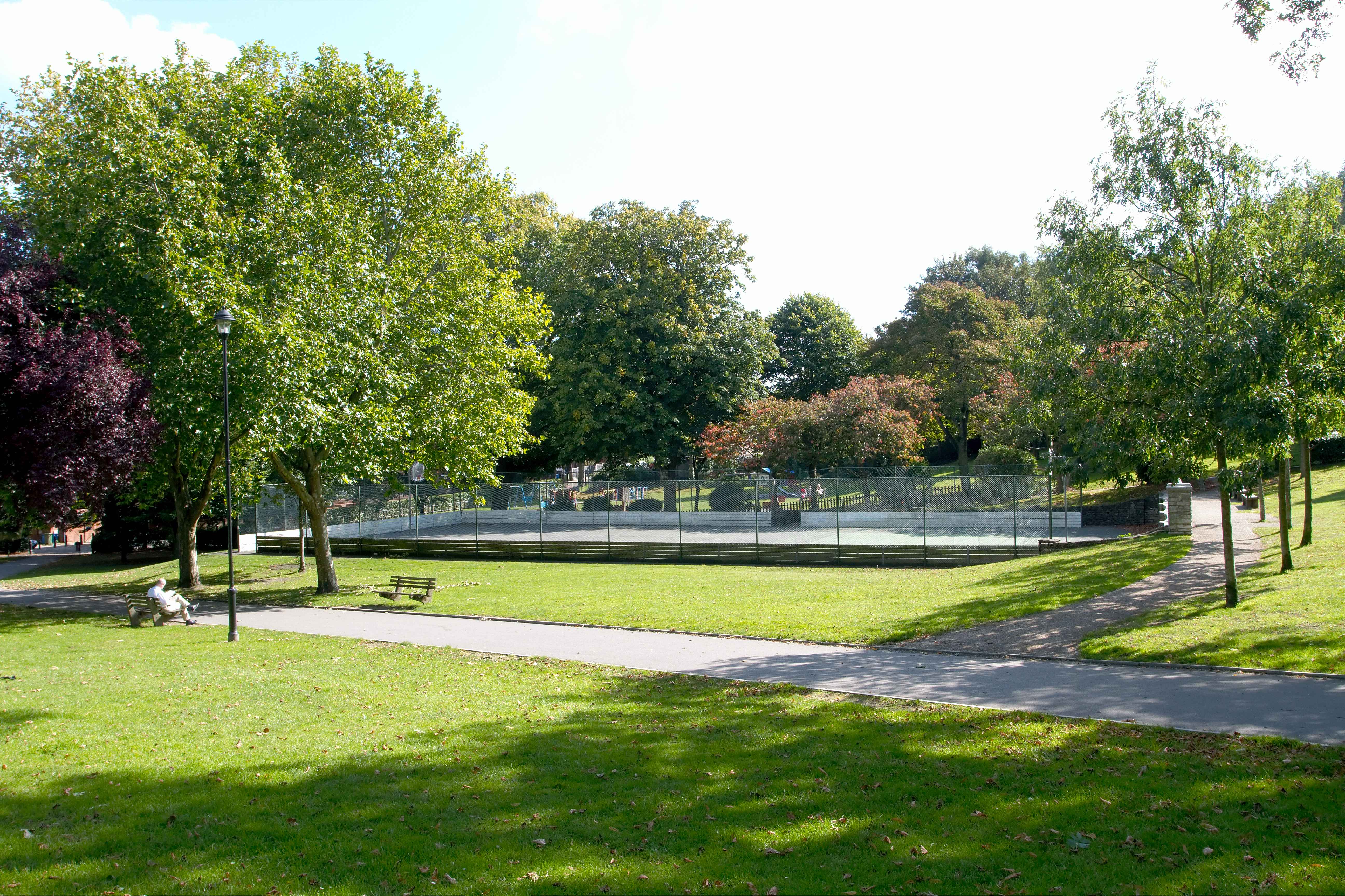 Municipal Gardens open grassy area looking towards ball court