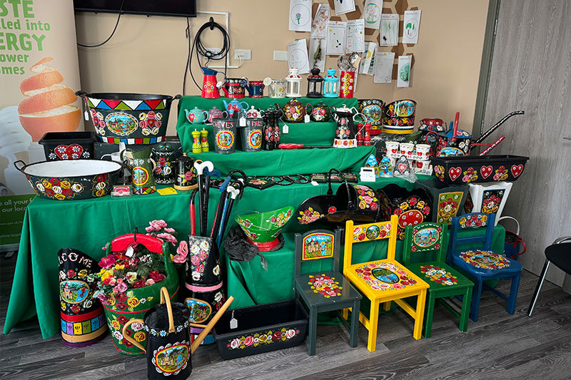 Stall Selling Chairs And Watering Cans