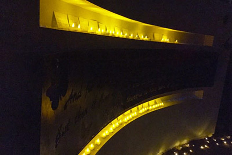 Wall alcoves with candles and cards