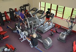 People using the gym equipment at Alderwood Leisure