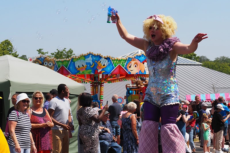 Stilt Walker In The Parade