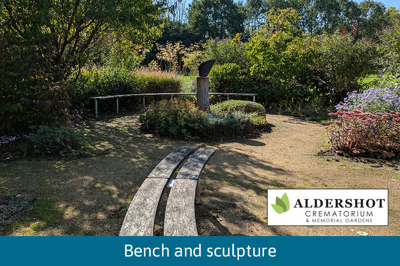 Bench And Sculpture